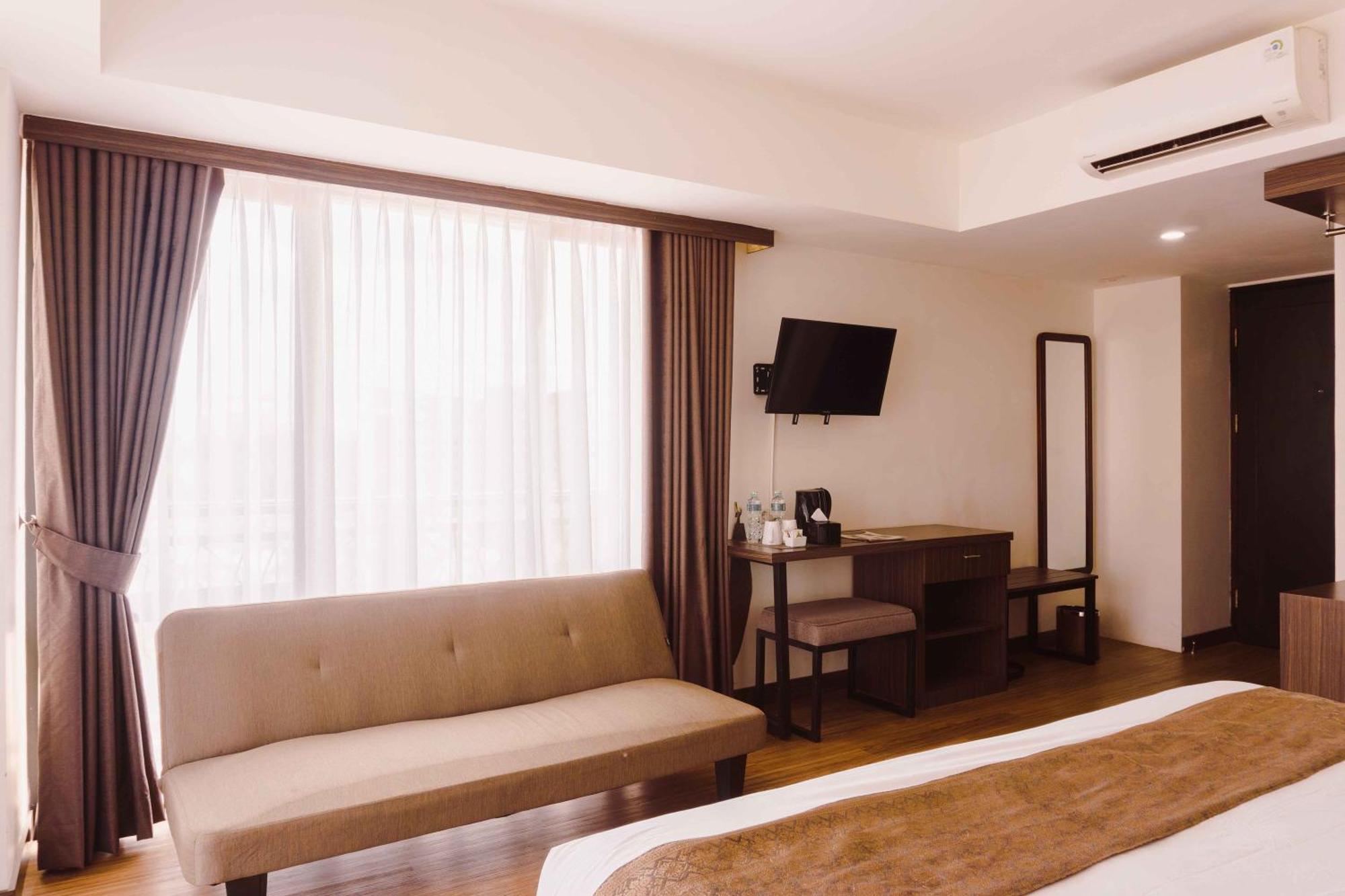 Fahira Hotel Syariah Букитинги Екстериор снимка
